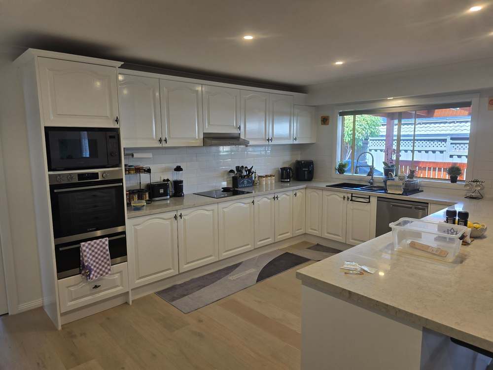 Freshly painted kitchen cabinetry